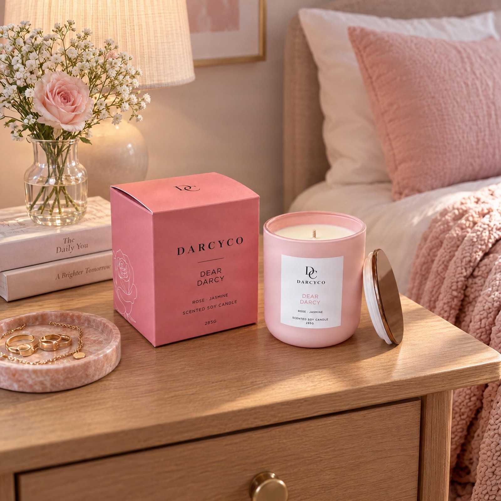 Dear Darcy candle in a bedroom