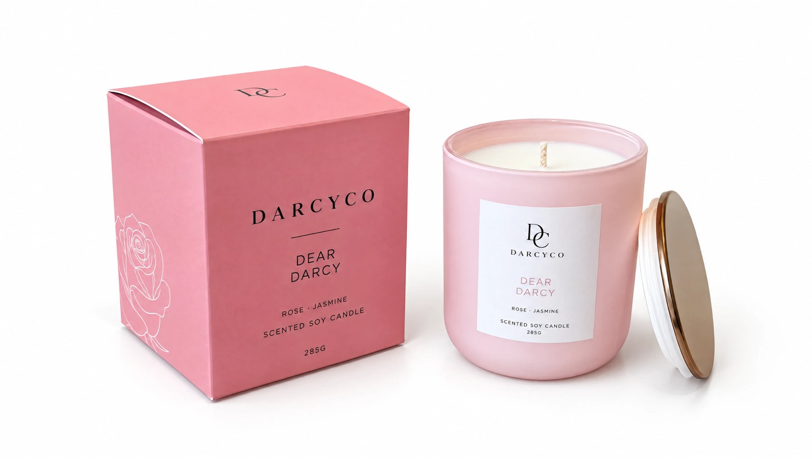 Dear Darcy candle and box on white, side view